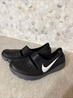 Nike Solar Soft Men's Black Slip-On Casual Shoes with White Swoosh